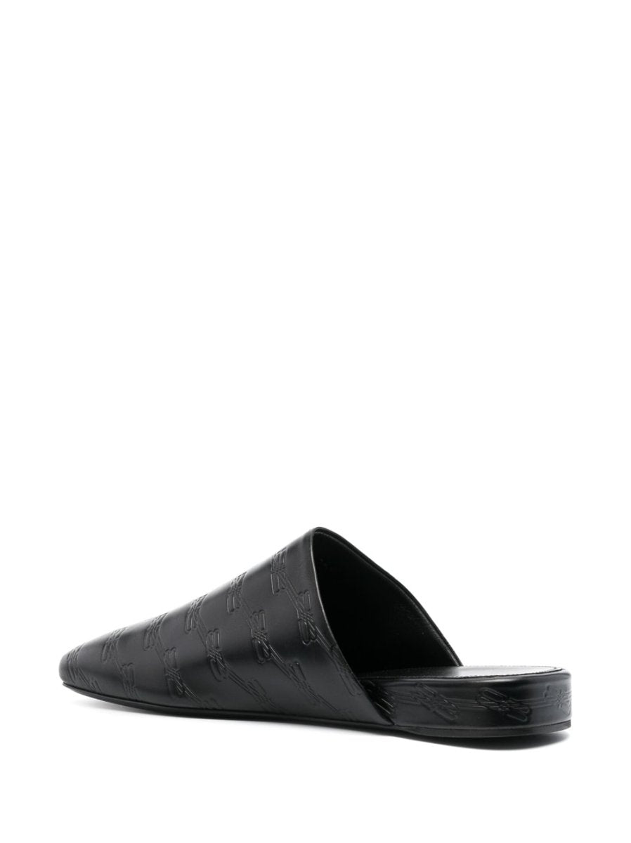 Balenciaga debossed - logo leather mules - mondo moda griffe