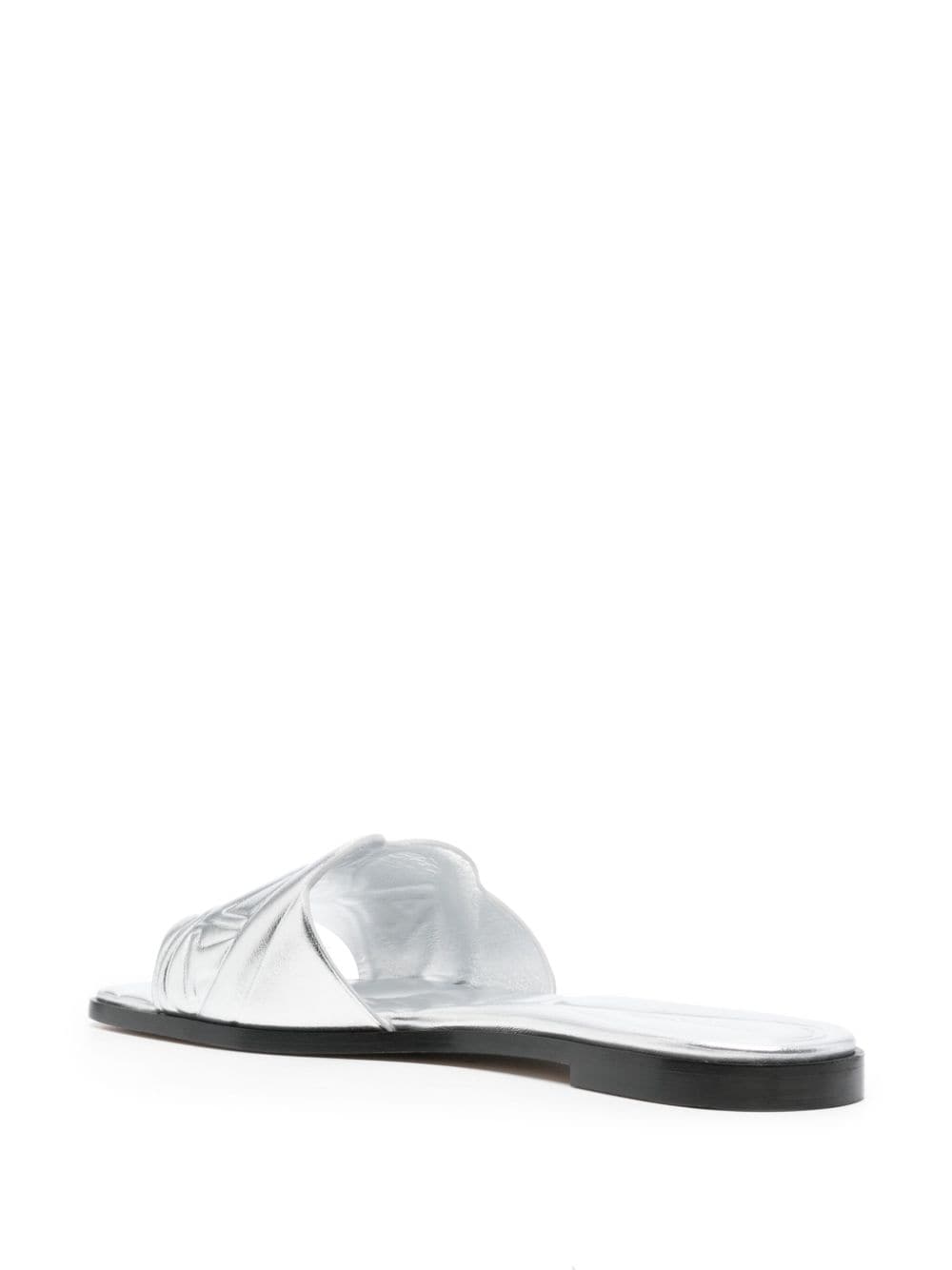 Alexander McQueen Slide sandals with embossed logo - mondo moda griffe