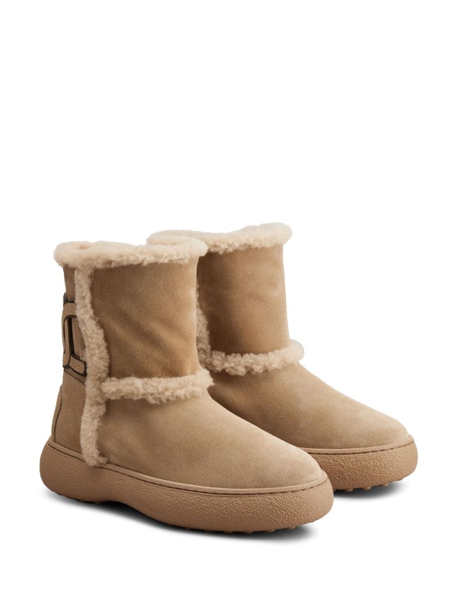 Tod's Kate suede and shearling ankle boots - mondo moda griffe