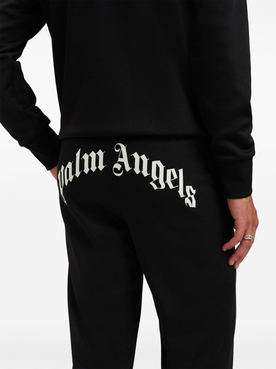 Palm Angels curved logo track pants - mondo moda griffe