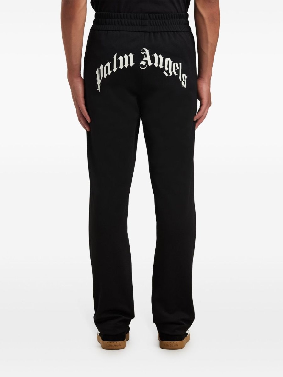 Palm Angels curved logo track pants - mondo moda griffe