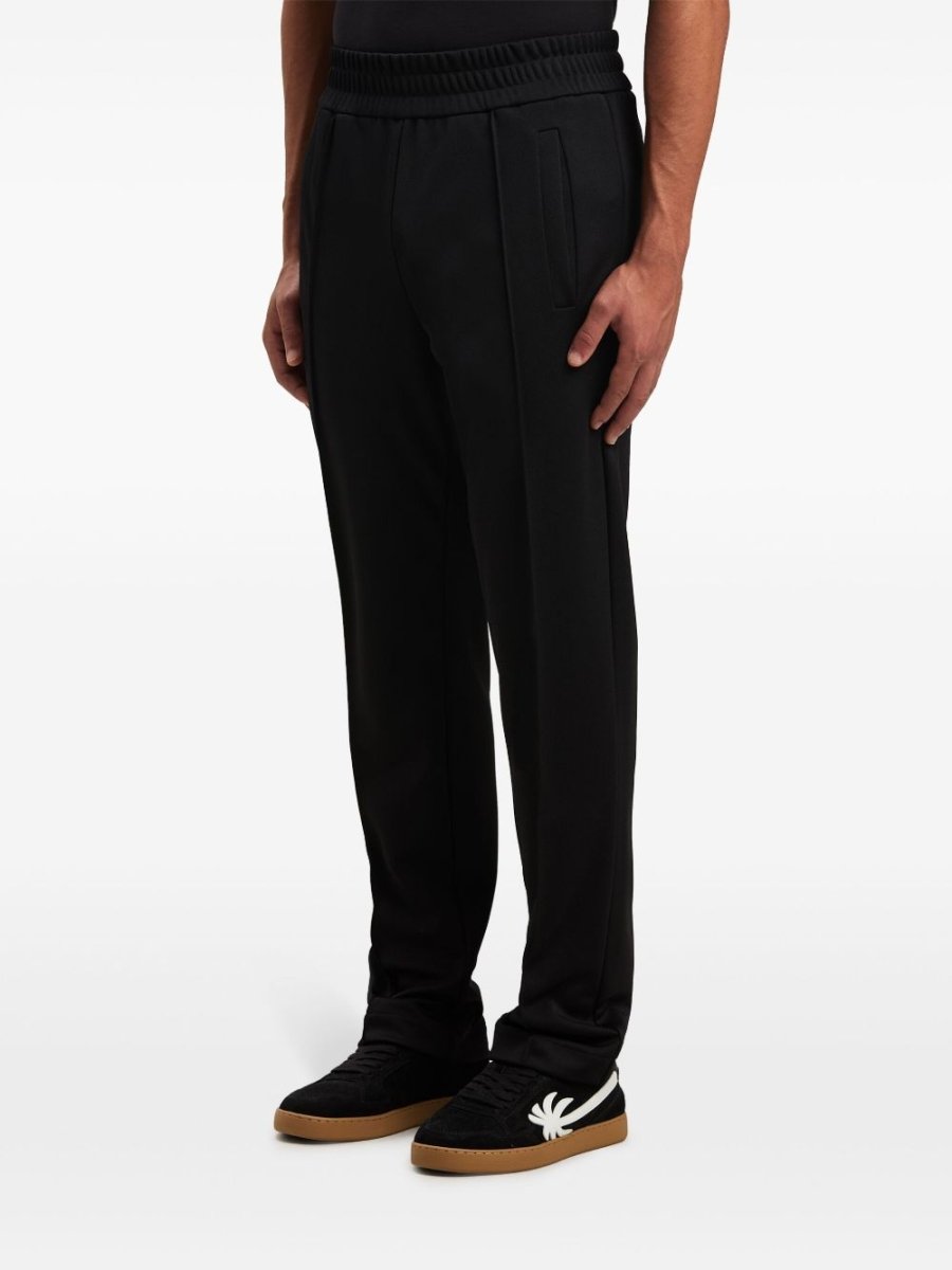 Palm Angels curved logo track pants - mondo moda griffe