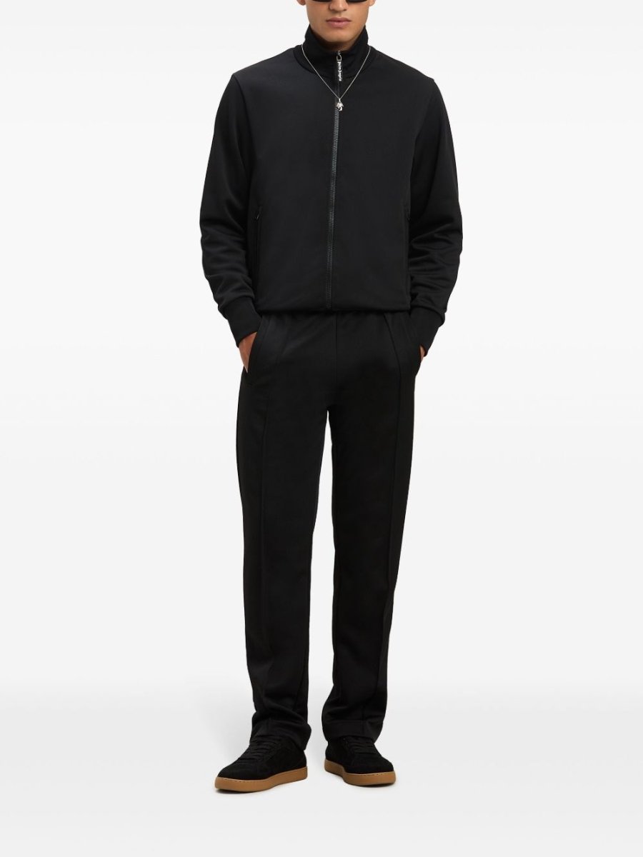 Palm Angels curved logo track pants - mondo moda griffe