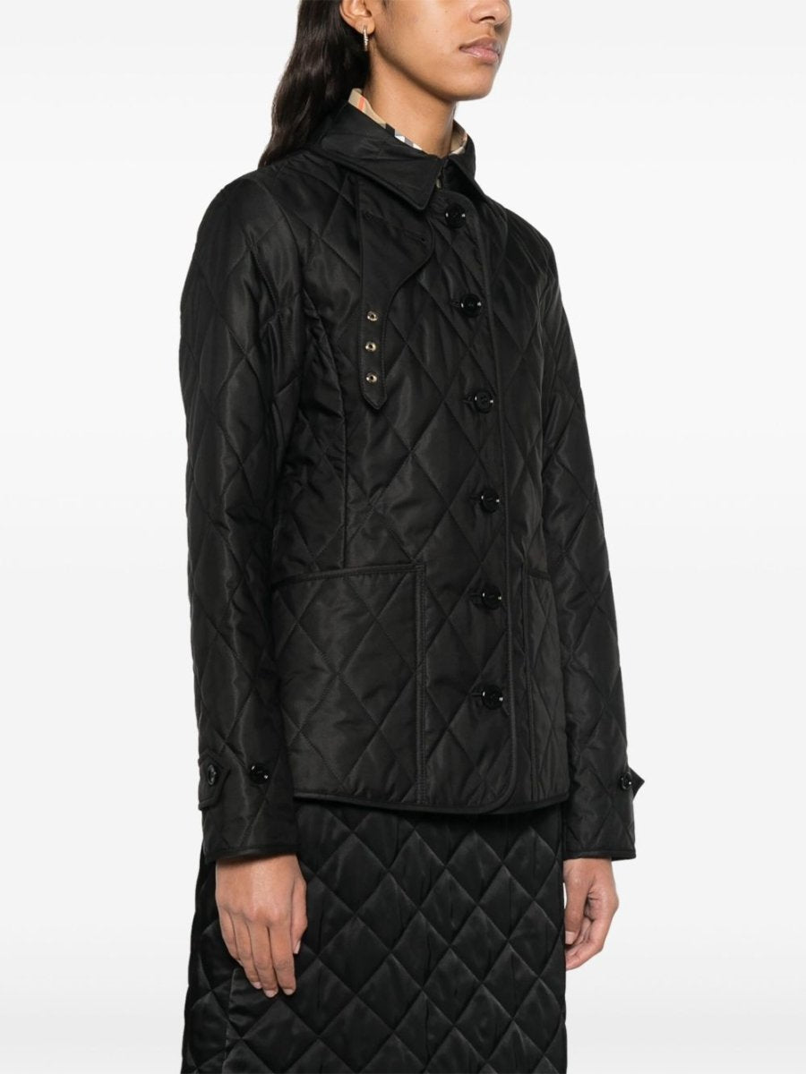 Burberry Tailored jacket with quilted high collar - mondo moda griffe